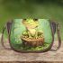 Cute cartoon frog sitting on a tree stump with big eyes saddle bag