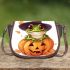 Cute cartoon frog wearing a witch hat sitting on a pumpkin saddle bag