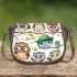 Cute cartoon owls sitting on tree branches saddle bag