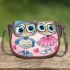 Cute cartoon owls wearing cute saddle bag