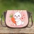 Cute cartoon rabbit is playing with an orange carrot saddle bag