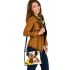 Cute chihuahua puppy with big eyes sitting next to a sunflower shoulder handbag