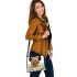 Cute golden retriever with easter eggs and white daisies shoulder handbag