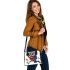 Cute owl with big eyes colorful feathers and beautiful wings perched shoulder handbag
