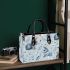 Cute pastel blue bunnies and floral pattern small handbag