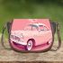 Cute pink owl sitting on top of a cute pastel car saddle bag