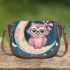 Cute pink owl with a bow and glasses sitting on the moon saddle bag