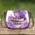 Cute purple owl sitting on top of books surrounded by pink roses saddle bag