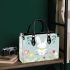 Cute white rabbit sitting on the swing small handbag