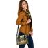 Deer head surrounded by forest and animals shoulder handbag