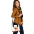 Deer with antlers made of autumn leaves stands shoulder handbag