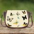 Featuring various butterflies in flight saddle bag