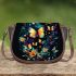 Glowing butterflies dance among vibrant flowers saddle bag