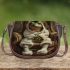 Green frog in a white bunny costume sitting on a chair saddle bag