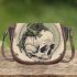 Green frog playing the banjo on top of human skull saddle bag