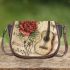 Music notes and guitar and rose and dragonfly Saddle Bag