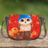 Owl wearing blue hat sitting on wood saddle bag