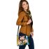 Painting of calla lilies in bold geometric shapes shoulder handbag