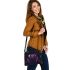 Purple frog with bright green eyes and on a solid shoulder handbag