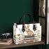 Rabbit sitting on top of books surrounded by flowers small handbag