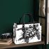 Sea turtle in black and white with a splash water effect small handbag