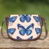 Seamless pattern with a digital illustration of blue butterflies saddle bag