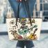 skeleton king with guitar trumpet dogs and music notes Leather Tote Bag