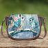 Two cute owls with feathers in shades of blue saddle bag