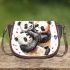 Two cute pandas hugging surrounded saddle bag