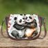 Two cute pandas hugging surrounded saddle bag