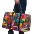 Vibrant and colorful painting of fish 3d travel bag