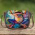 Vibrant painting of an happy dancing frog saddle bag