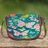 Vibrant pattern of pink and turquoise butterflies saddle bag