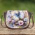 Watercolor painting of butterflies and flowers saddle bag