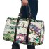 Whimsical scene of three frogs perched on branches 3d travel bag