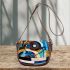 Abstract composition with geometric shapes saddle bag