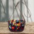 Abstract eye and dynamic shapes saddle bag