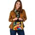 Abstract modern painting of an exotic bird shoulder handbag