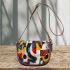 Abstract painting with various shapes saddle bag