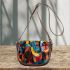 Abstract painting with various shapes saddle bag