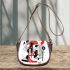 Abstract shapes in red grey and black saddle bag