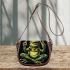 Adorable smiling green frog sitting saddle bag