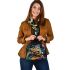 An artistic illustration of a frog in vibrant colors shoulder handbag