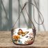 Beautiful butterfly surrounded by flowers saddle bag