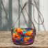 Beautiful colorful butterfly with wings made of feathers saddle bag