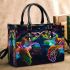 Black light poster of two rainbow sea turtles kissing small handbag