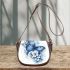 Blue butterfly with white flowers around saddle bag