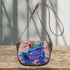 Blue frog with rainbow stripes saddle bag