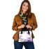 Butterflies and purple flowers shoulder handbag