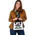 Cartoon frog wearing witch hat shoulder handbag